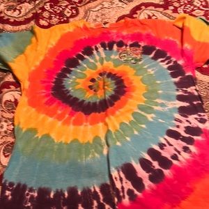 A tie-dyed blew thru T-Shirt size large